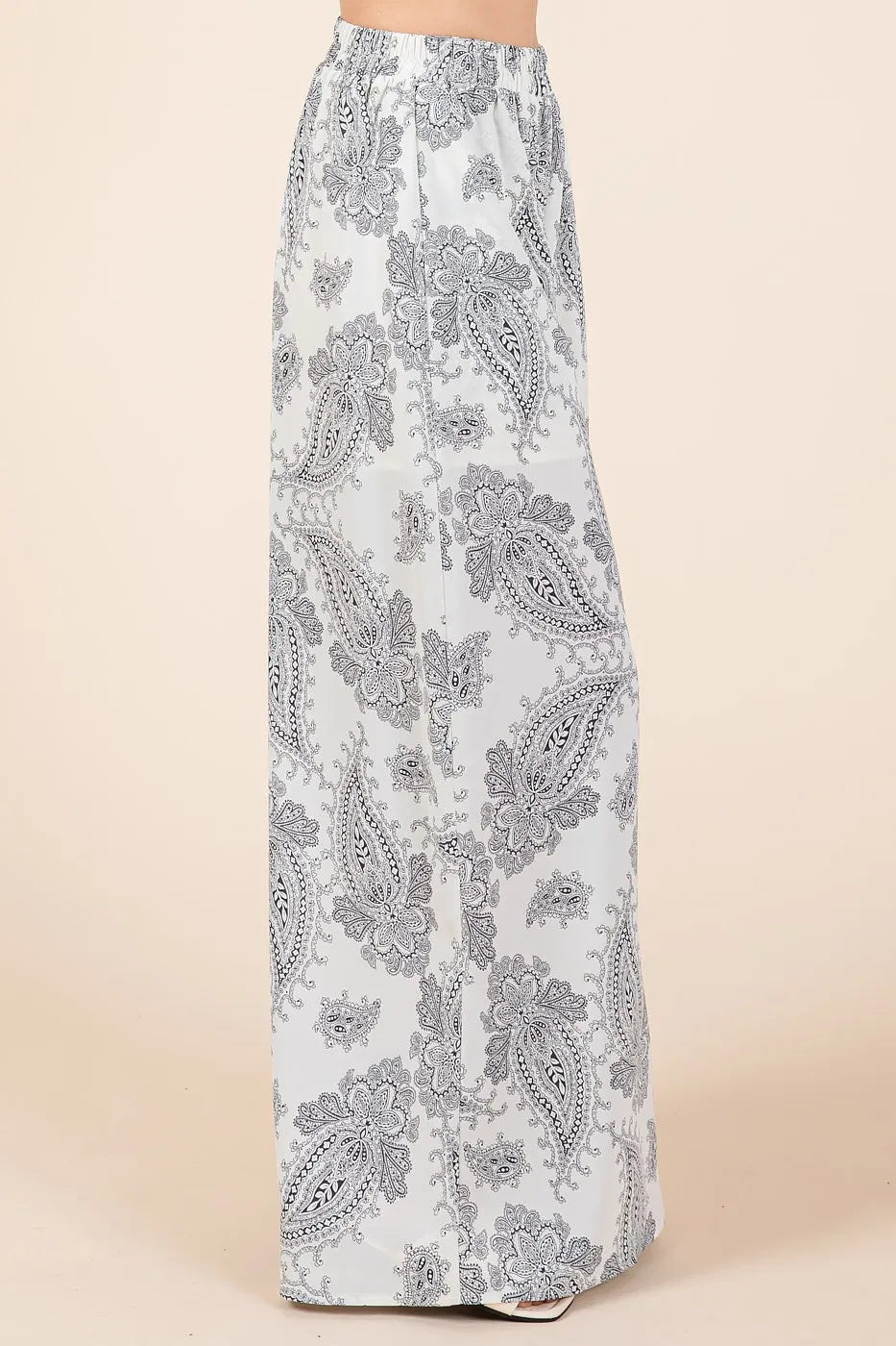 White high-waisted paisley print pants from Mittoshop set
