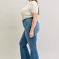 Judy Blue Full Size Mid Rise Slim Bootcut Tummy Control Release Hem Jeans Plus Size - DAVERRI FASHIONS