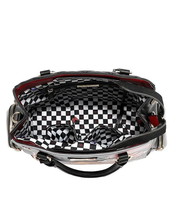 Nicole Lee USA eco-leather handbag with shiny silver body, black leather handles, checkered lining and side pockets