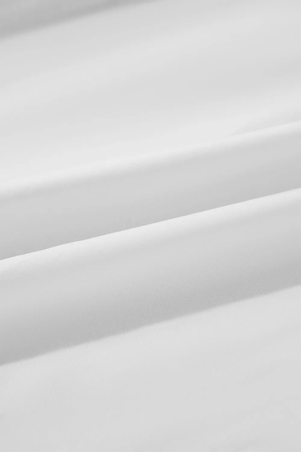 White satin shirt with glossy texture, ribbon bowtie collar, flounce sleeves