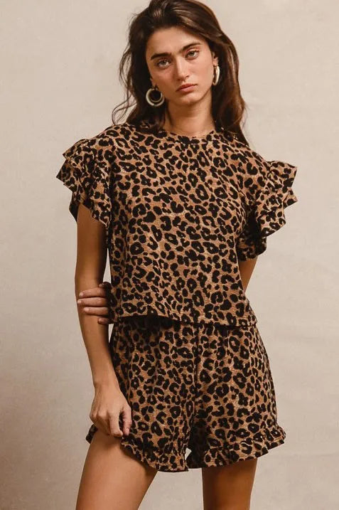 BiBi leopard print waffle texture ruffle sleeve romper with black trim