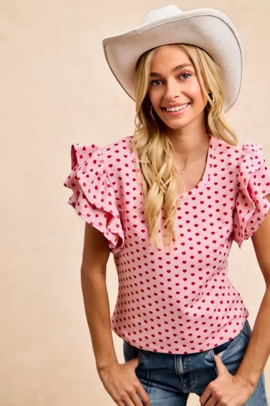 BiBi pink heart-patterned knit top with ruffled short sleeves