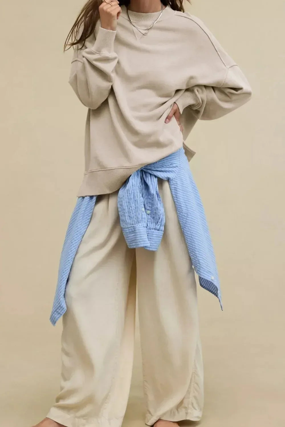 Side Slit Round Neck Long Sleeve Sweatshirt - DAVERRI FASHIONS