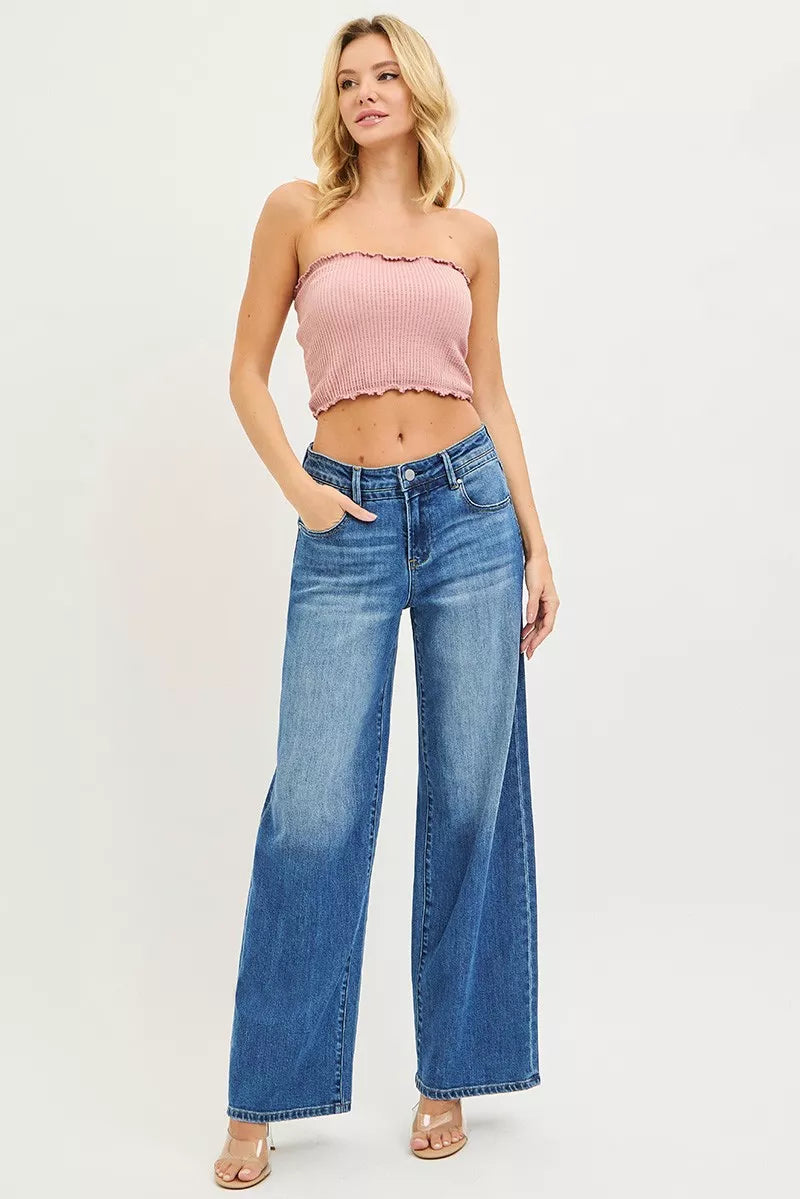Pink ribbed strapless crop top with frayed hemline and RISEN slouchy baggy jeans