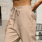 Beige Daverri Fashions linen blend tapered joggers with drawstring waist and pockets