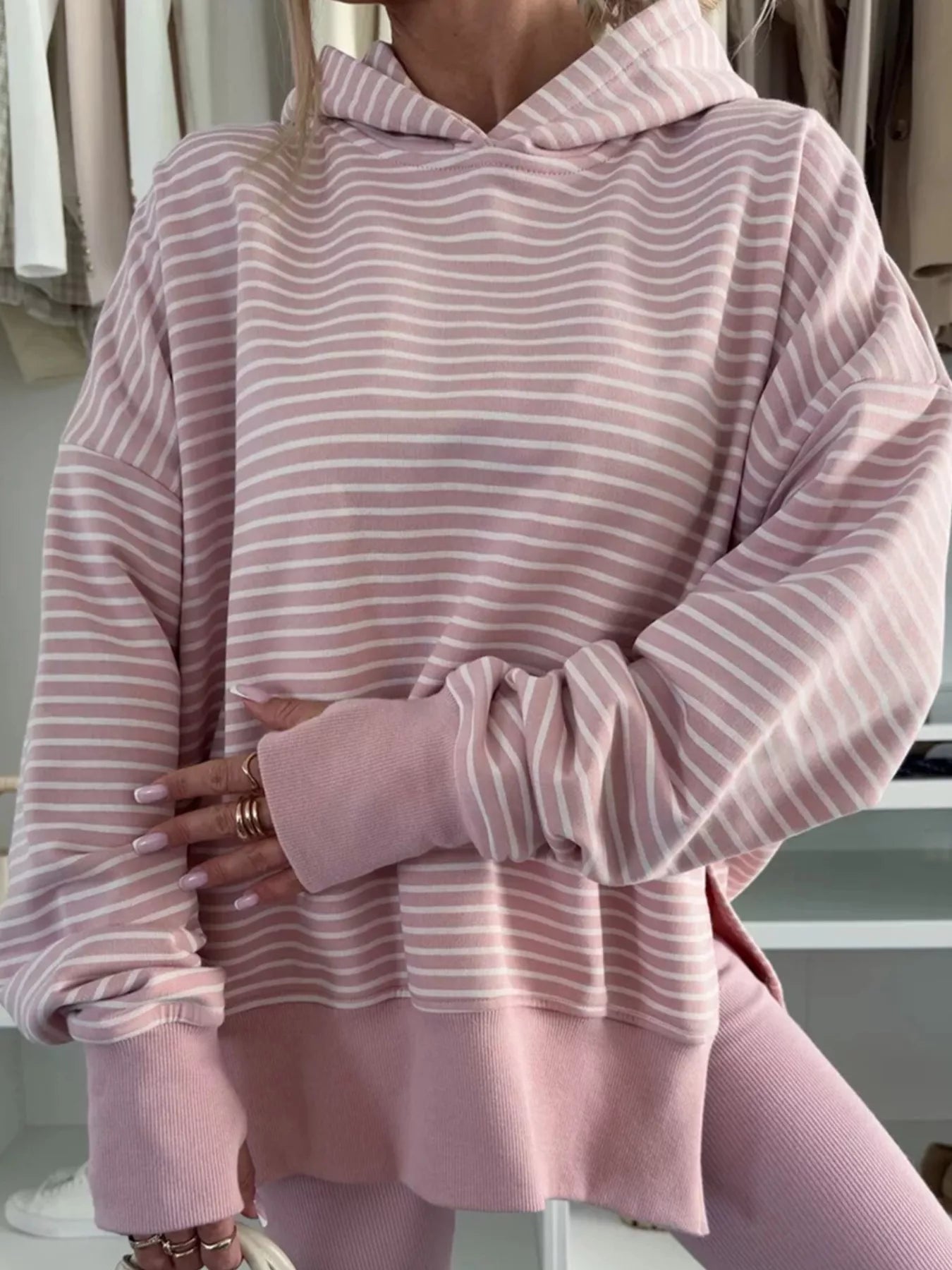 Dusty pink striped thumbhole hoodie with side slits and drop shoulders