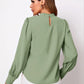 Ruched mock neck sage green long-sleeve blouse with puffed shoulders