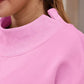 Soft pink mock neck dropped shoulder sweatshirt with ribbed collar