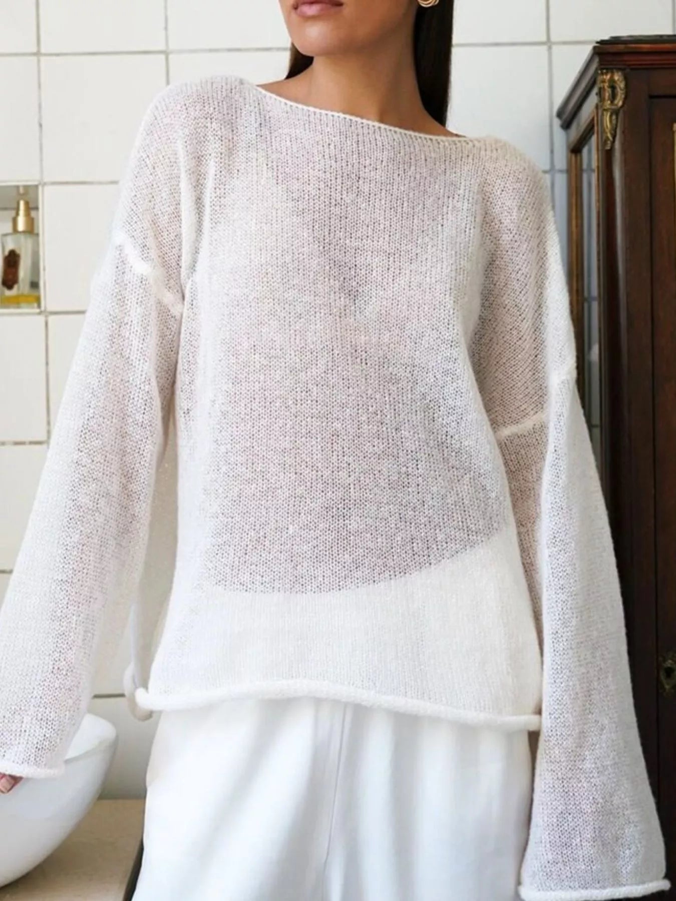 Boat neck dropped shoulder soft off-white knitted sweater with bell sleeves