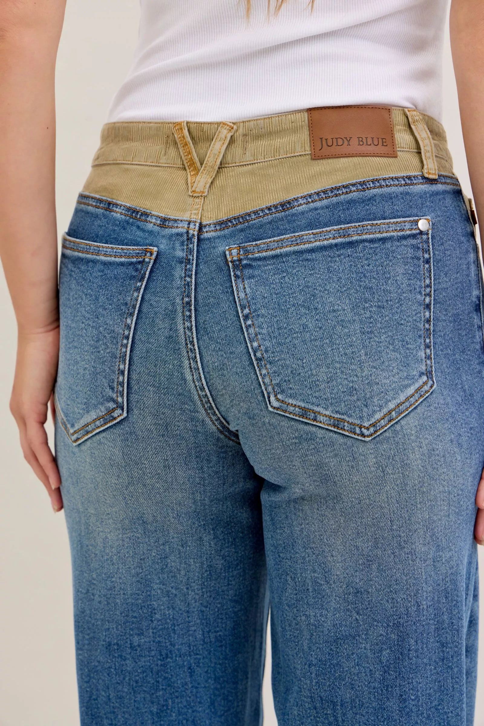 Judy Blue mid-rise straight jeans with tan corduroy waistband