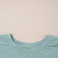 Oversize mint green cotton t-shirt with frayed denim star patch