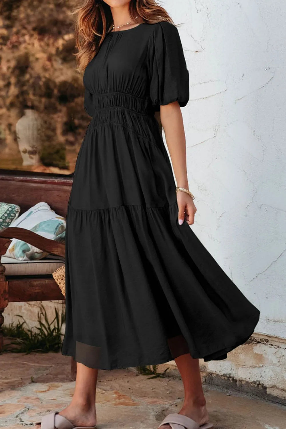Black puff-sleeve smocked high-waist flowy pleated midi dress