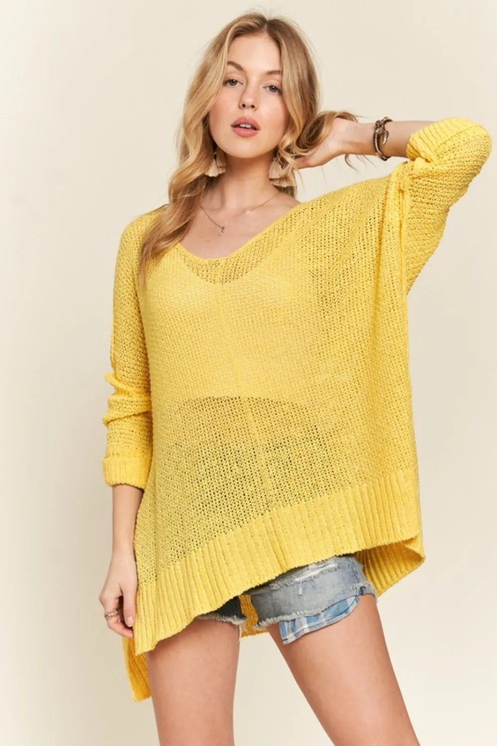 ADORA loose fit yellow v-neck knit sweater with ribbed cuffs
