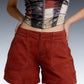 Daverri pocketed denim shorts in red with front pockets and straight hem
