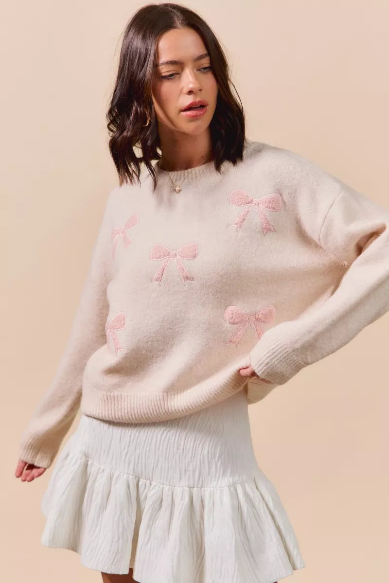SO ME cream knit sweater with pink embroidered bows
