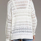 White open-knit sweater with textured pattern, ribbed cuffs and button details