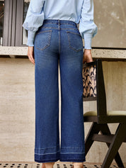Daverri Fashions high-rise loose wide-leg denim jeans in light blue wash with raw hem cuffs and subtle distress