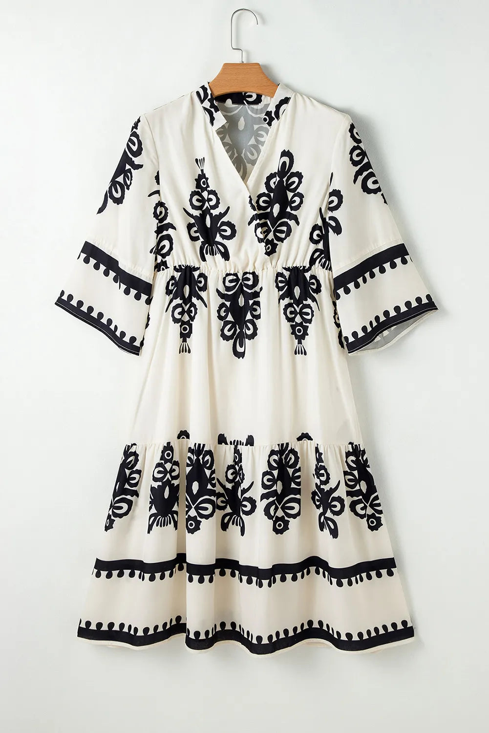 White and black floral embroidered half-sleeve knee-length cotton dress