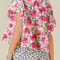 Pink floral boxy fit ruffled short sleeve blouse with peplum hem