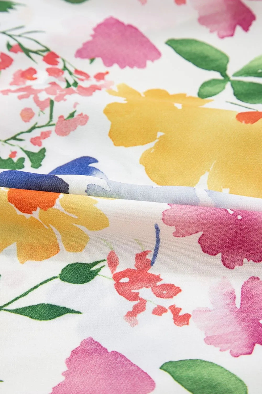 Floral boxy fit ruffled short sleeve blouse with watercolor floral fabric