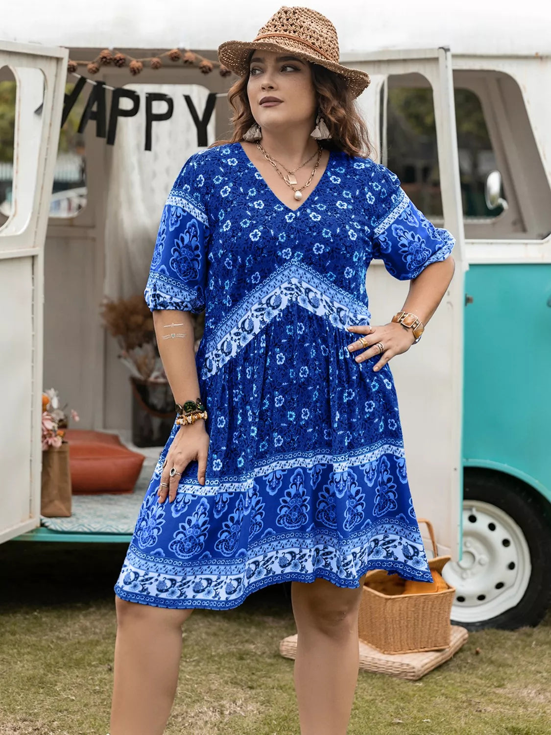 Plus size floral v-neck mini dress in vibrant blue bohemian style