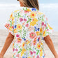 Floral boxy fit ruffled short sleeve blouse with vibrant blossoms