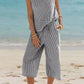 Daverri striped sleeveless top in black and white vertical stripes