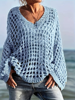 Light blue open-knit crochet sweater with V-neck and bell sleeves