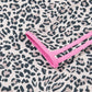 Women’s leopard print V-neck long sleeve top with pink trim