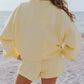 Pale yellow oversized sweatshirt with loose sleeves in relaxed fit set