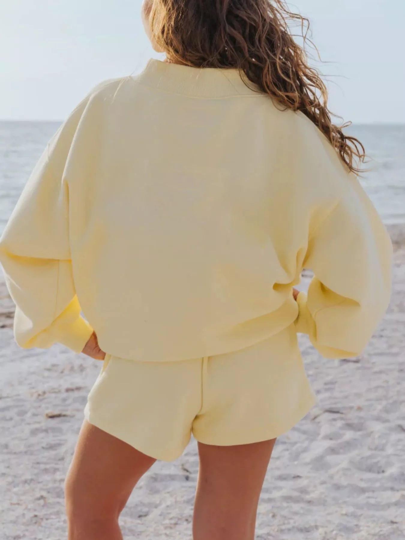 Pale yellow oversized sweatshirt with loose sleeves in relaxed fit set