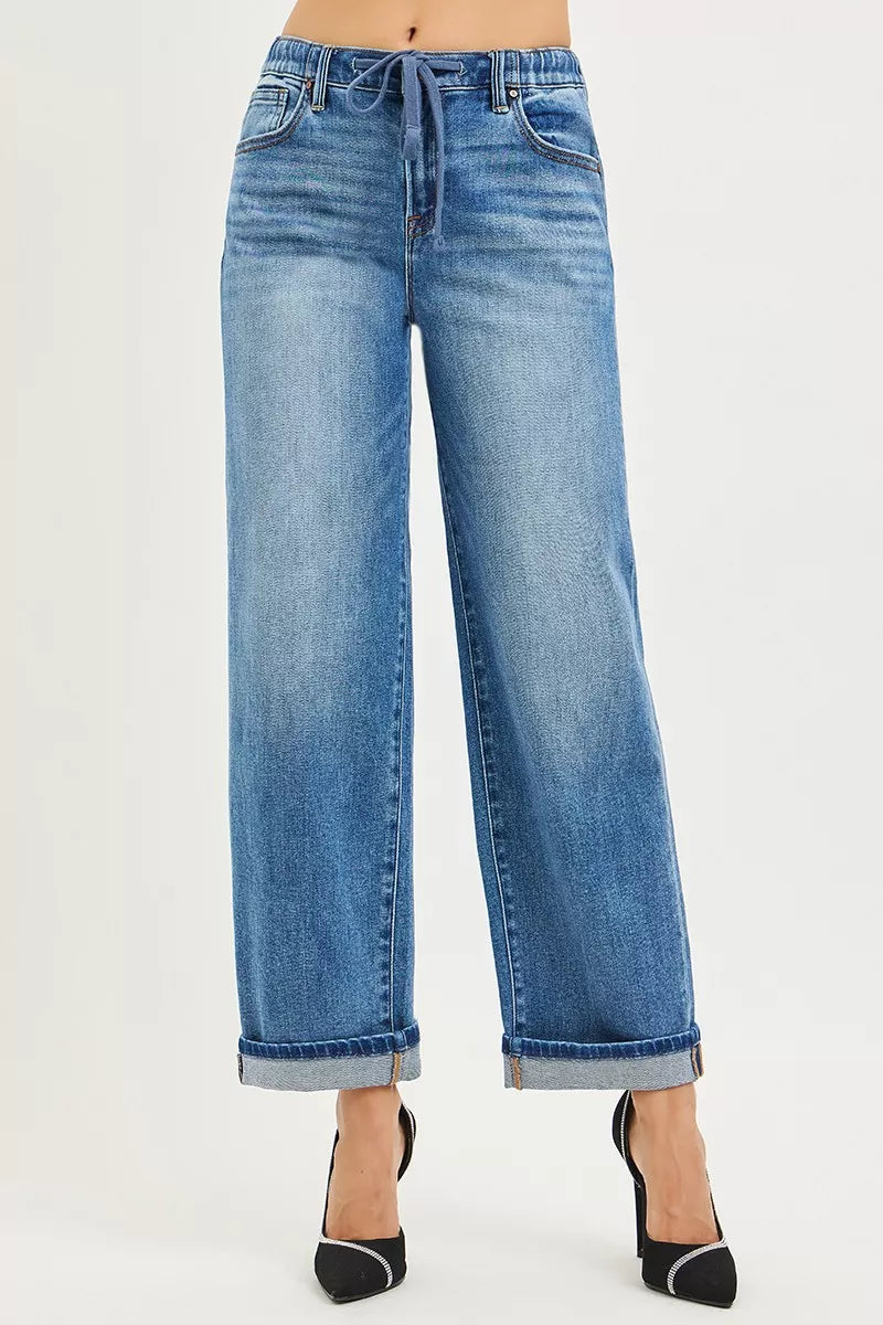 Blue denim wide-leg RISEN boyfriend jeans with drawstring waist and rolled cuffs