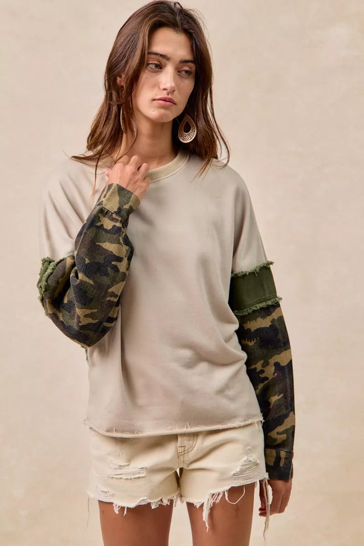 BiBi Camo Sleeve French Terry Top with Frayed Edge | Daverri Fashions