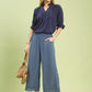 Navy blue ruffled v-neck blouse with short sleeves and Umgee linen pants