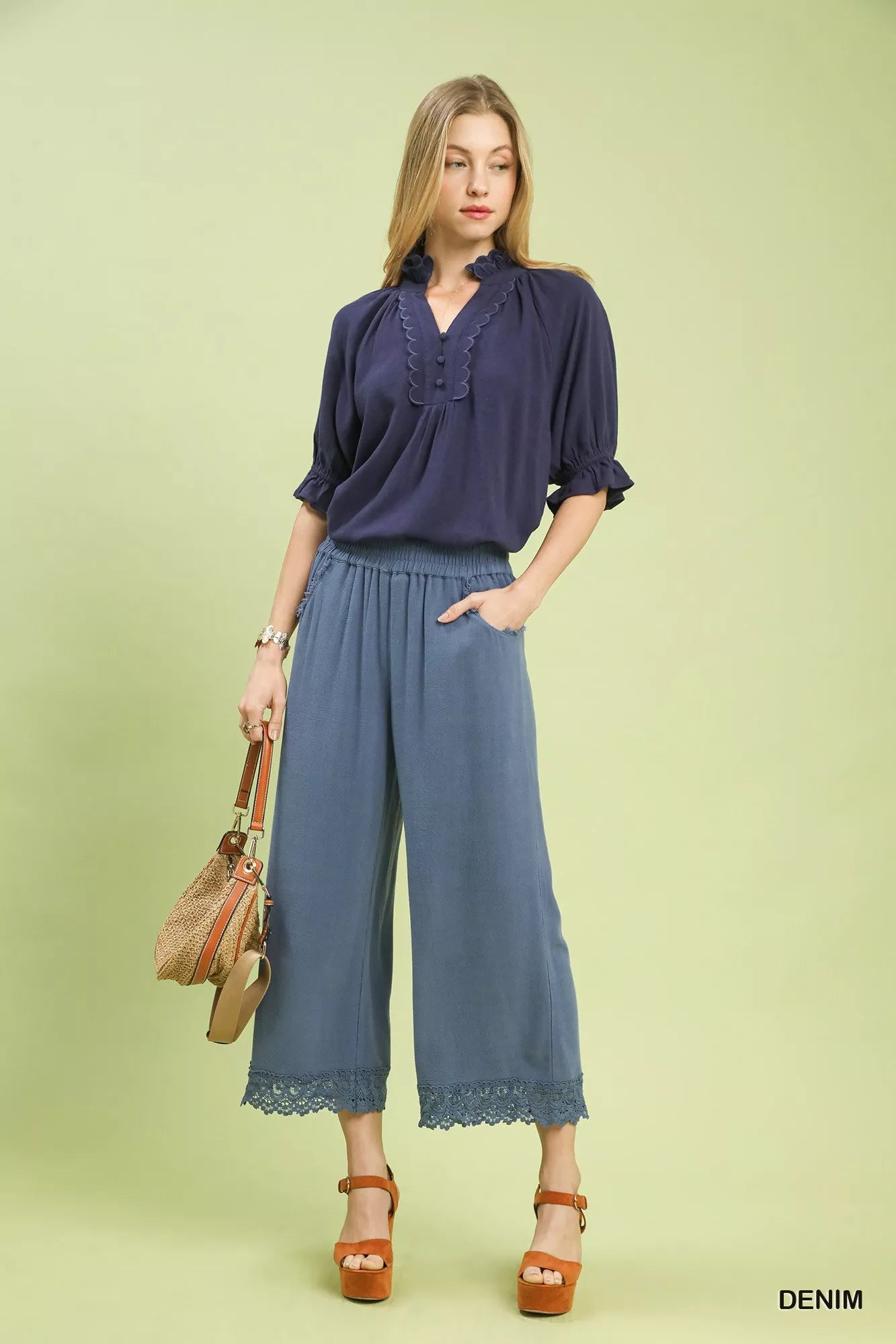 Navy blue ruffled v-neck blouse with short sleeves and Umgee linen pants