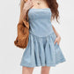 Daverri smocked crisscross back light blue denim strapless mini dress