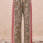 BiBi Leopard Print Pants with red white striped side panels