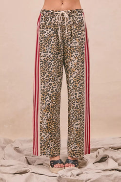 BiBi Leopard Print Pants with red white striped side panels
