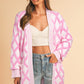 Pink rhombus pattern open front pocketed knit cardigan