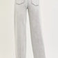 RISEN Slouchy Baggy Jeans in light-wash wide-leg denim with contrast stitching