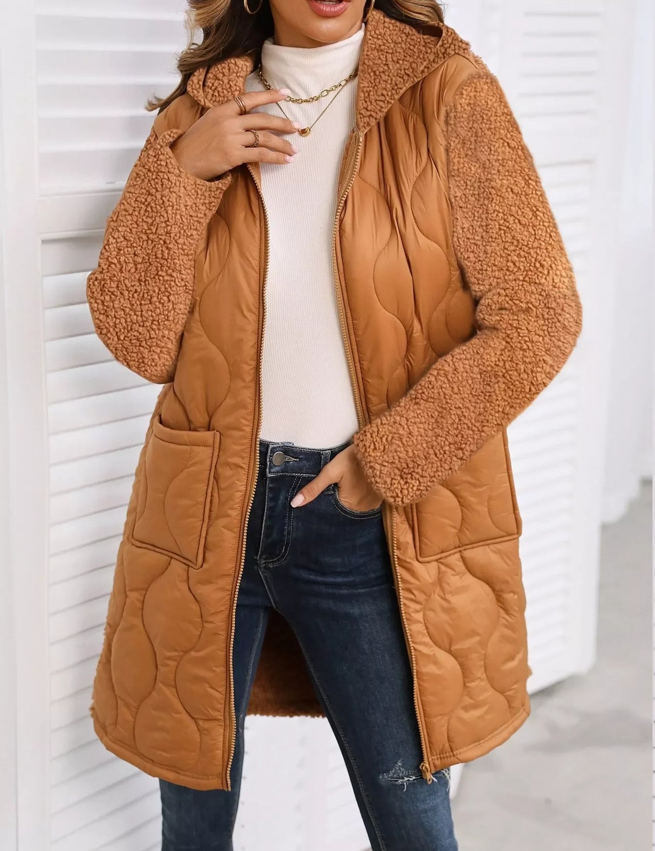 Brown zip-up hooded teddy bear coat with quilted design and pockets