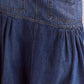 Daverri Midi Denim Skirt with blue fabric, two front pockets, and flared hem