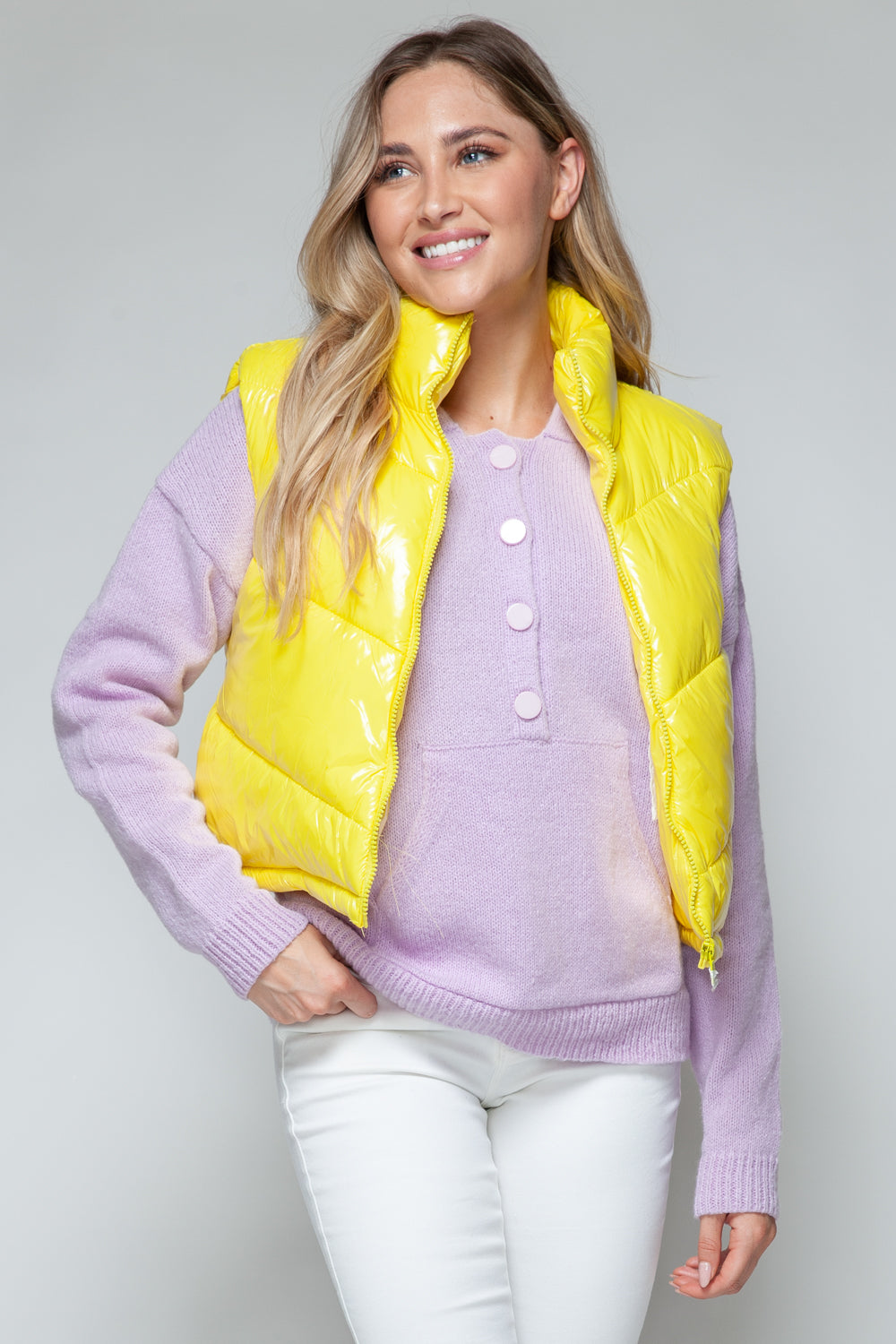 Bright yellow shiny quilted Snobbish zip-up turtleneck puffer vest with white buttons