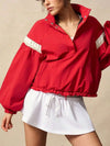 Red cropped bomber jacket with white ruffled sleeve stripes