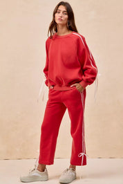 Red velour BiBi side lined bow details fleece sweatpants, UO brand