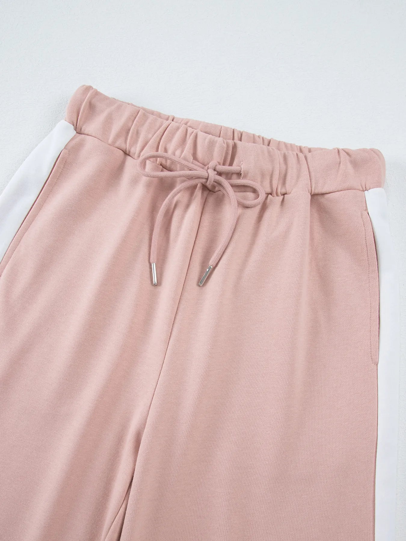Dusty rose paperbag waist pants in Daverri Fashions set