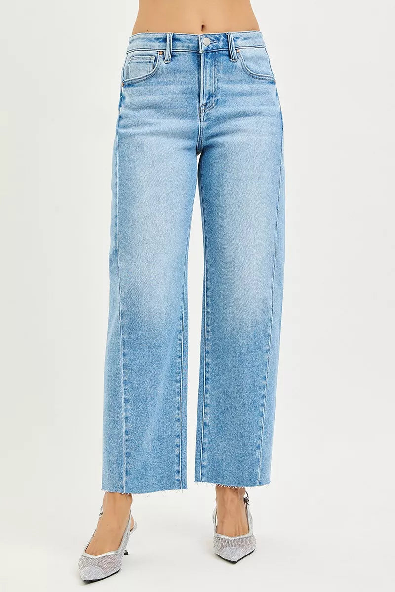 Light-wash high-rise wide-leg cropped barrel jeans with frayed hems