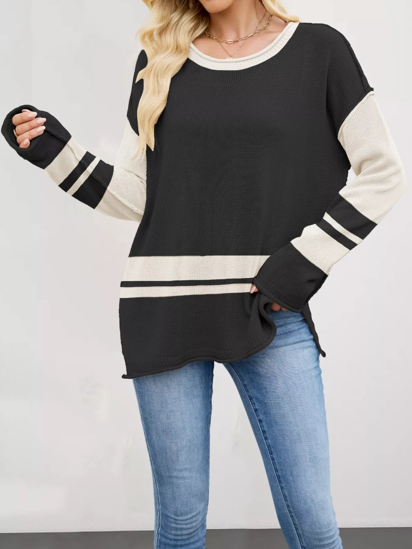 Black and cream color-blocked long-sleeve ribbed knit top with side slits