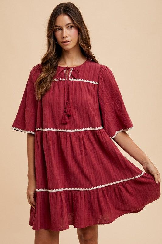 Annie Wear Tassel Contrast Trim Tie Neck Half Sleeve Tiered Dress - DAVERRI FASHIONS