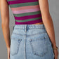 Ribbed sleeveless crop top with purple pink green white stripes in Slit Raw Hem Midi Denim Skirt
